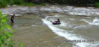 Ganaraska River, guys with inner tube playing in the river